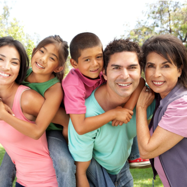 Family with children and grandmother smiling